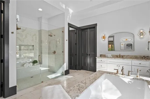 a bed room with a bed and a window