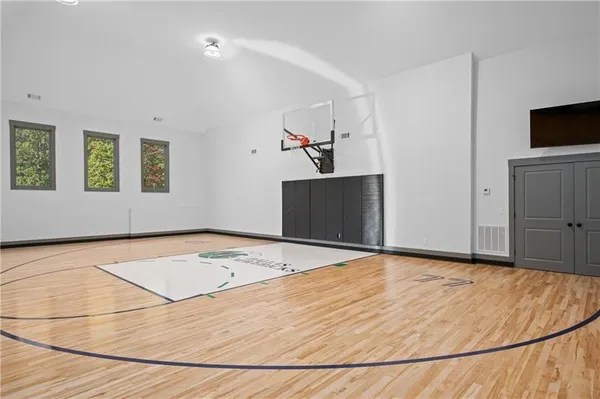 a living room with furniture and a rug