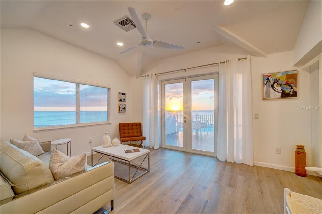 17852 Lee Avenue Redington Shores, FL 33708 - Photo 11 of 38 a living room with furniture and a flat screen tv