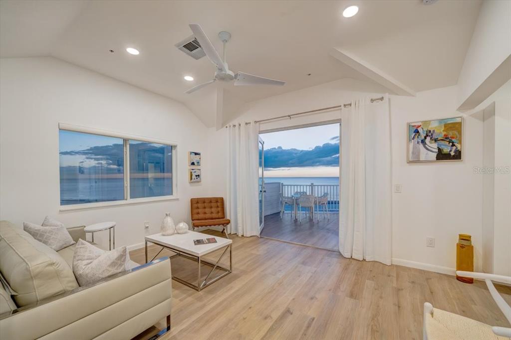 17852 Lee Avenue Redington Shores, FL 33708 - Photo 13 of 38 a living room with furniture and a flat screen tv