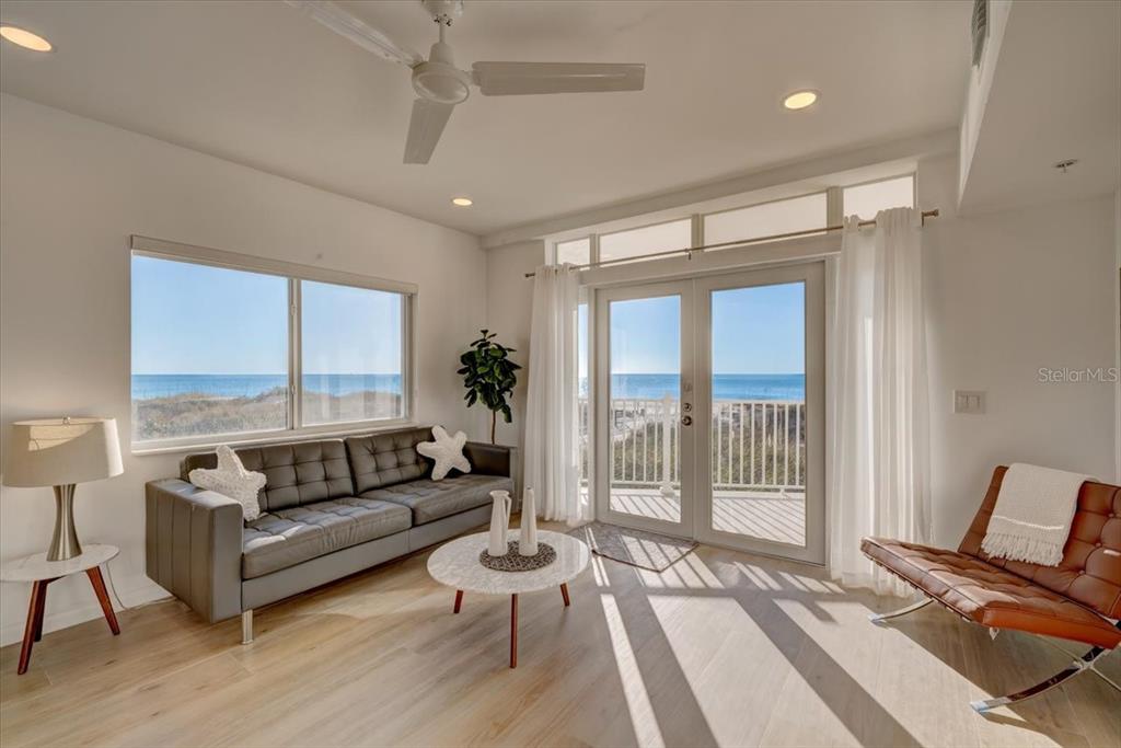 17852 Lee Avenue Redington Shores, FL 33708 - Photo 28 of 38 a living room with furniture and a large window