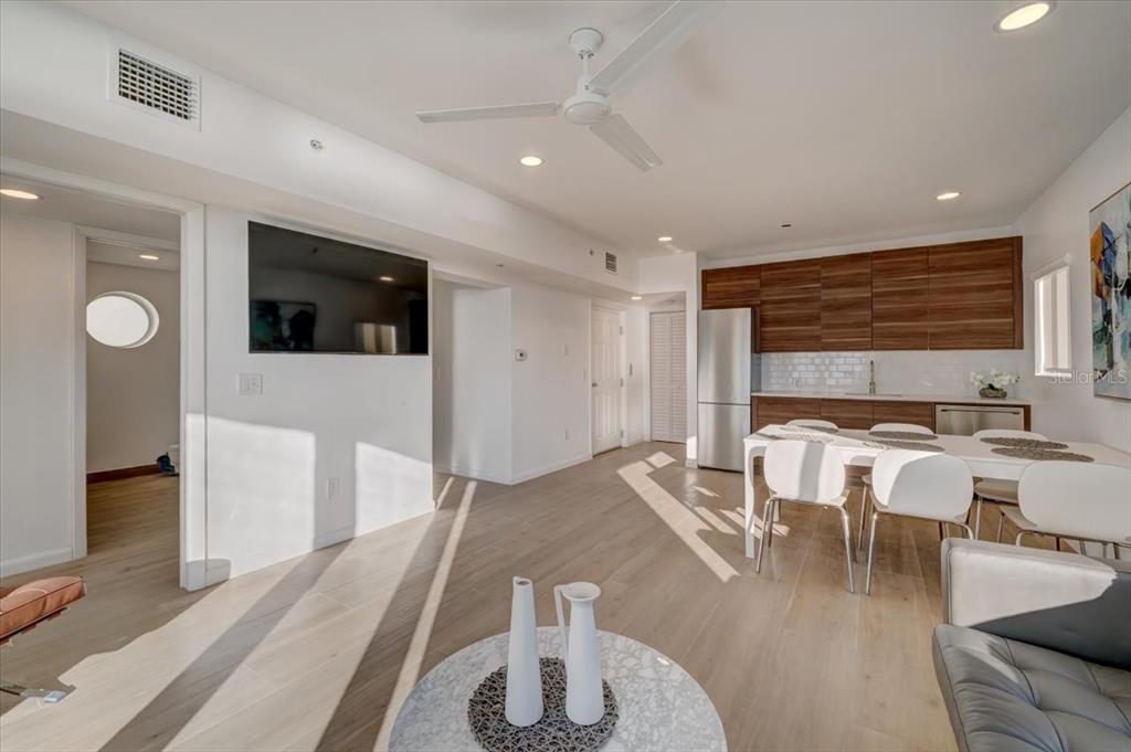 17852 Lee Avenue Redington Shores, FL 33708 - Photo 30 of 38 a living room with furniture and a flat screen tv
