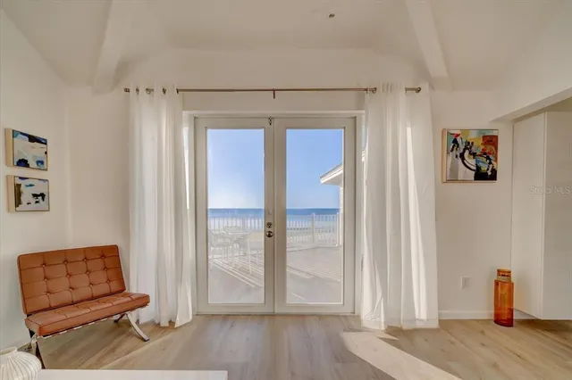 a room with furniture and wooden floor