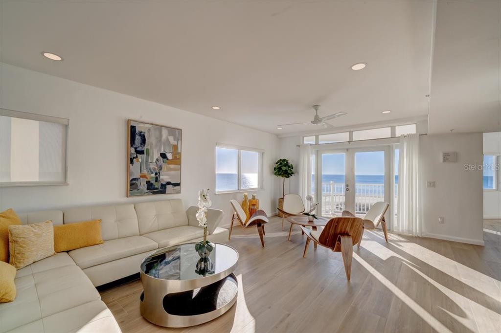 17852 Lee Avenue Redington Shores, FL 33708 - Photo 8 of 38 a living room with furniture and a wooden floor