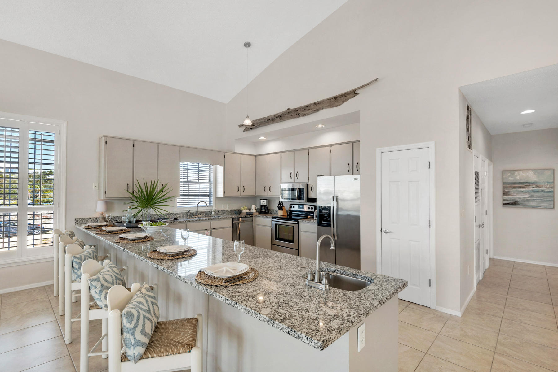 39 Sandy Lane Santa Rosa Beach, FL 32459 - Photo 18 of 87 a kitchen with a refrigerator and a stove top oven