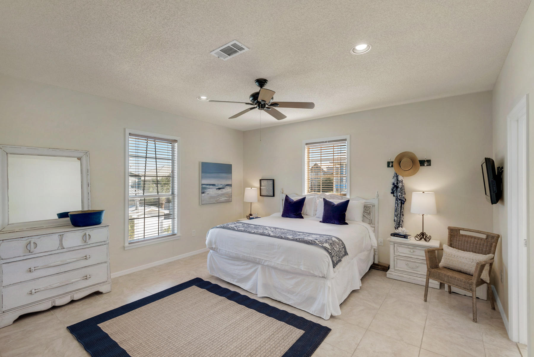 39 Sandy Lane Santa Rosa Beach, FL 32459 - Photo 21 of 87 a bedroom with a bed a chandelier and a window