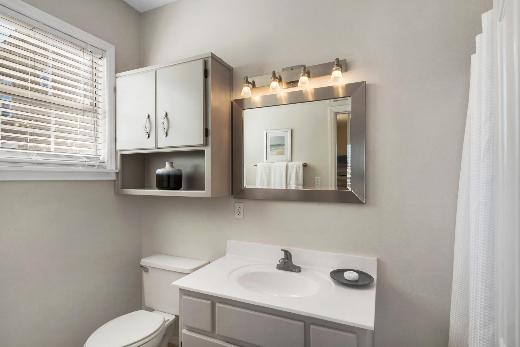 39 Sandy Lane Santa Rosa Beach, FL 32459 - Photo 25 of 87 a bathroom with a sink and a microwave