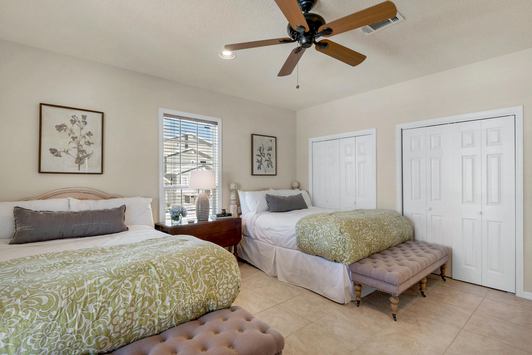39 Sandy Lane Santa Rosa Beach, FL 32459 - Photo 27 of 87 a spacious bedroom with a bed a couch and a chandelier