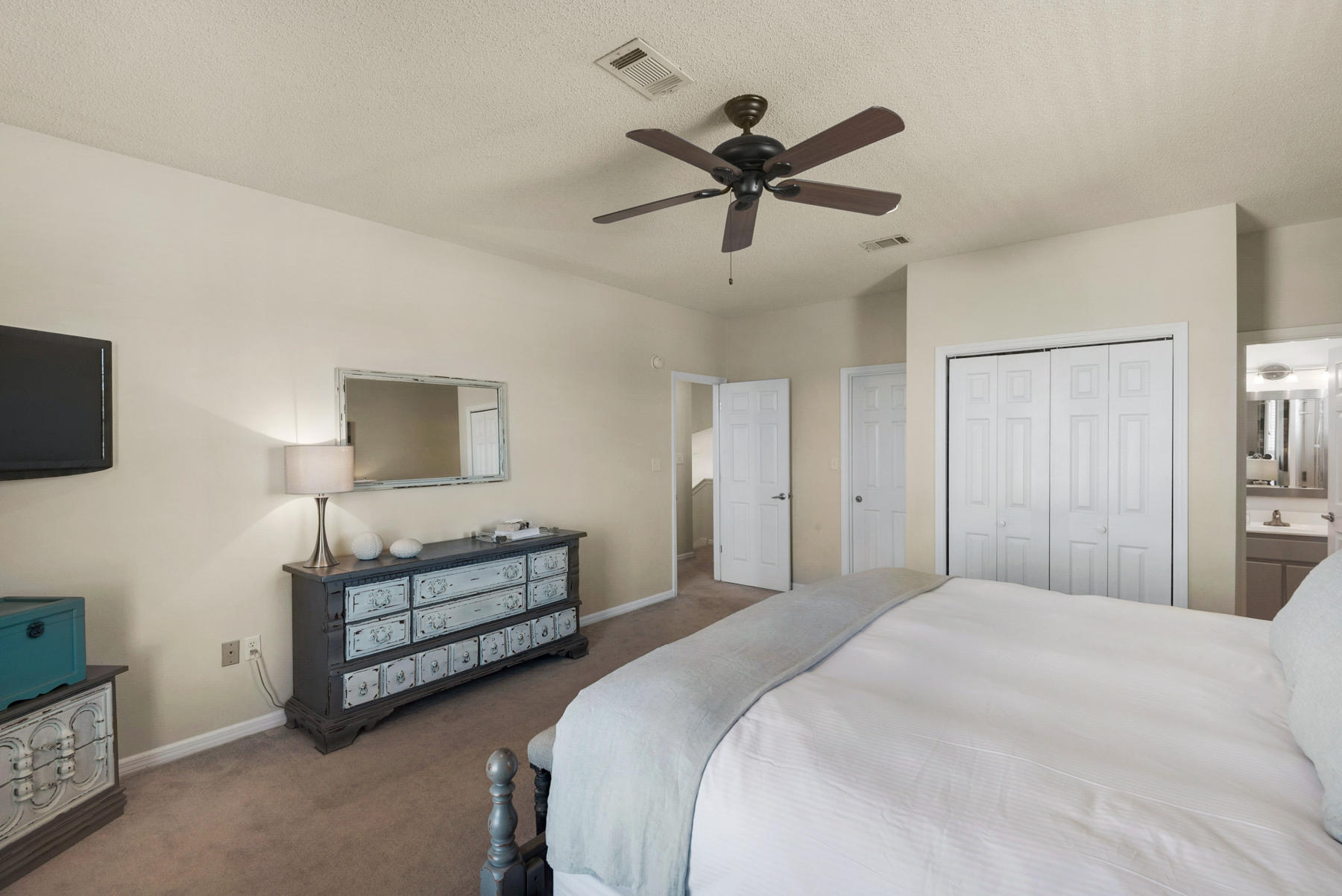 39 Sandy Lane Santa Rosa Beach, FL 32459 - Photo 34 of 87 a bedroom with a bed chandelier and a window