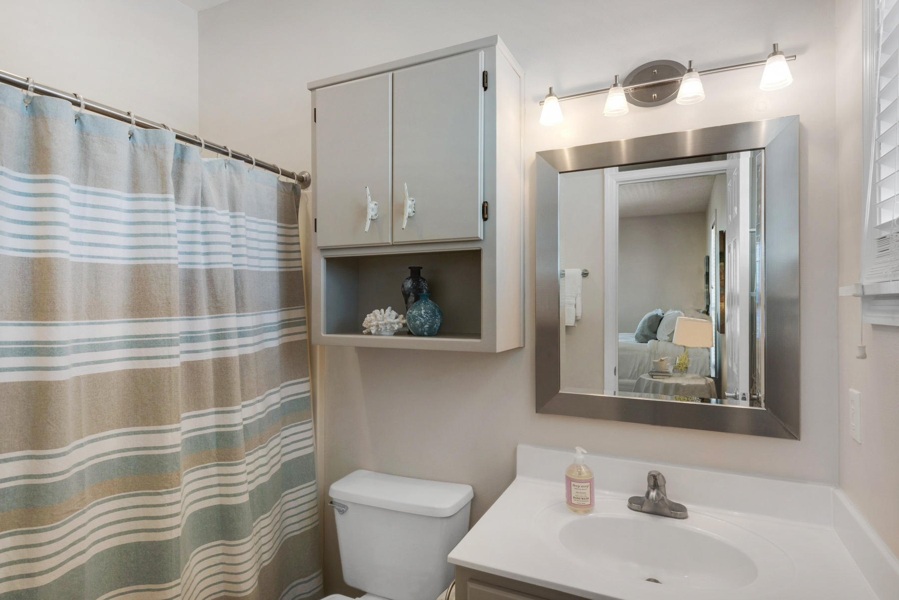 39 Sandy Lane Santa Rosa Beach, FL 32459 - Photo 36 of 87 a bathroom with a sink and a mirror