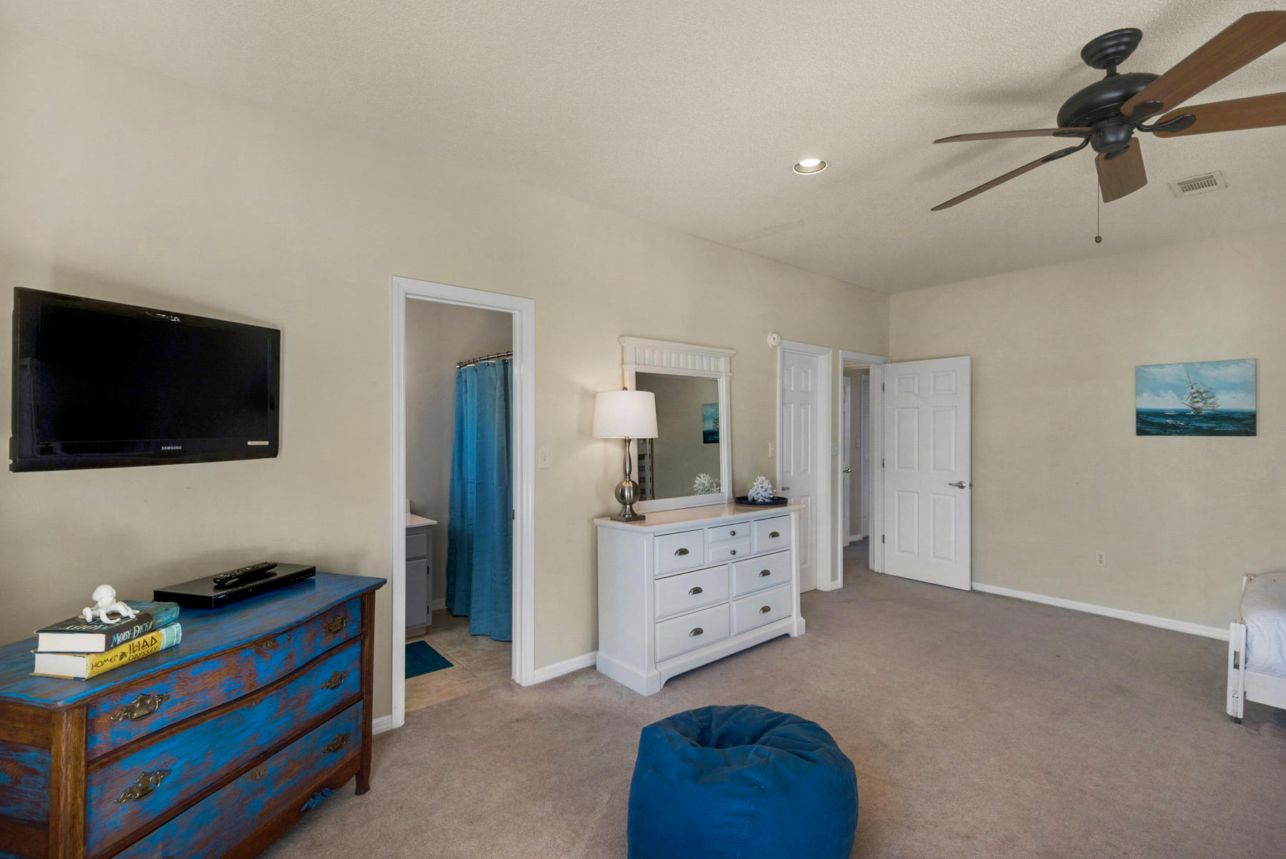 39 Sandy Lane Santa Rosa Beach, FL 32459 - Photo 40 of 87 a bedroom with furniture and a flat screen tv