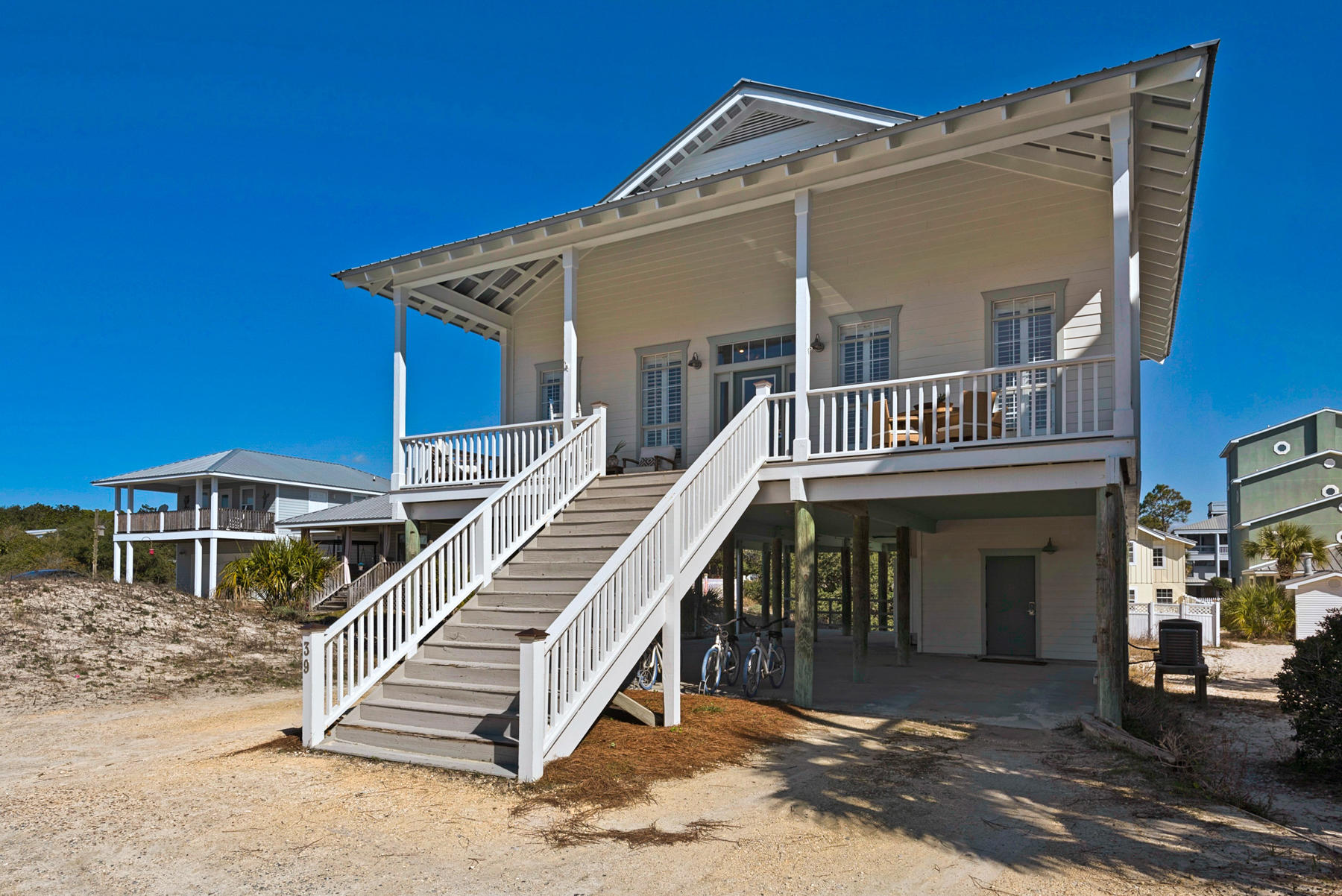 39 Sandy Lane Santa Rosa Beach, FL 32459 - Photo 44 of 87 a front view of a house with a balcony