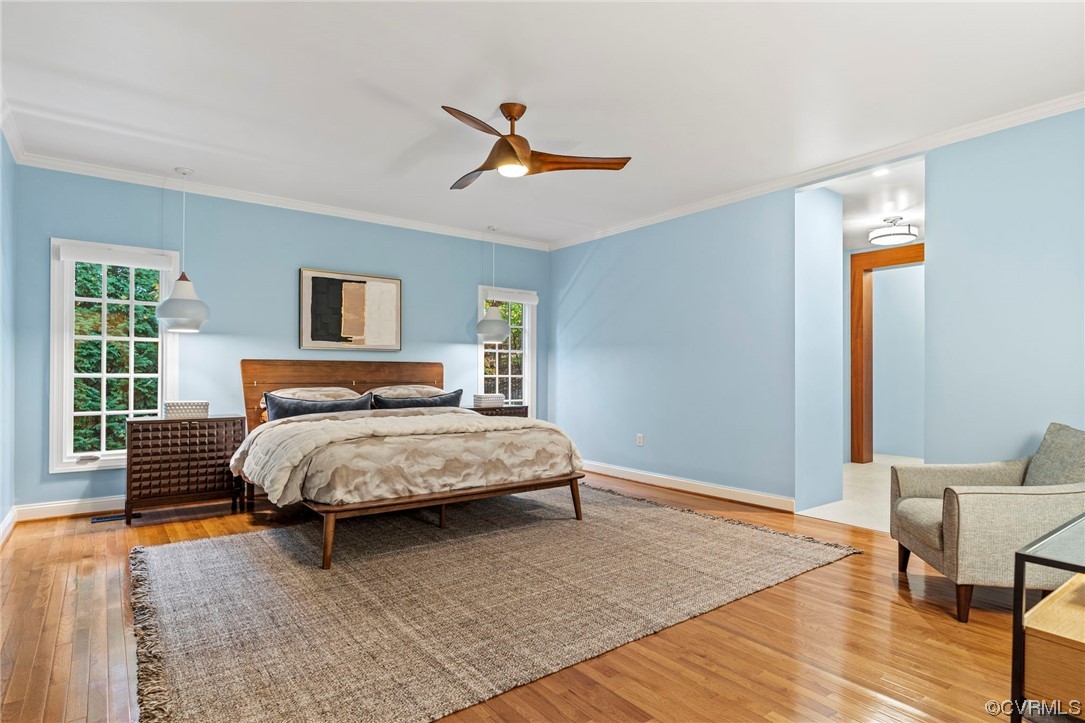 13213 Edmonton Drive Midlothian, VA 23113 - Photo 19 of 49 a bedroom with a large bed and a chandelier