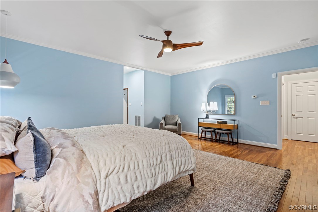 13213 Edmonton Drive Midlothian, VA 23113 - Photo 20 of 49 a bedroom with bed and wooden floor