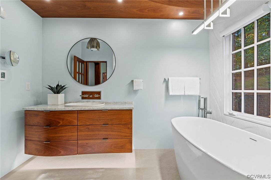 13213 Edmonton Drive Midlothian, VA 23113 - Photo 24 of 49 a bathroom with a sink mirror and vanity