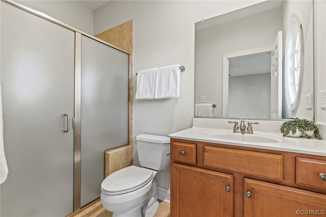 13213 Edmonton Drive Midlothian, VA 23113 - Photo 27 of 49 a bathroom with a granite countertop sink toilet and mirror