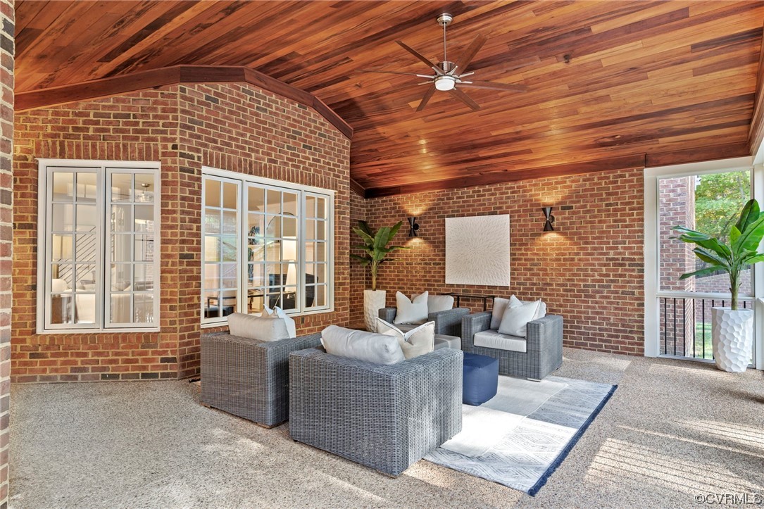13213 Edmonton Drive Midlothian, VA 23113 - Photo 28 of 49 a balcony with furniture and a potted plant