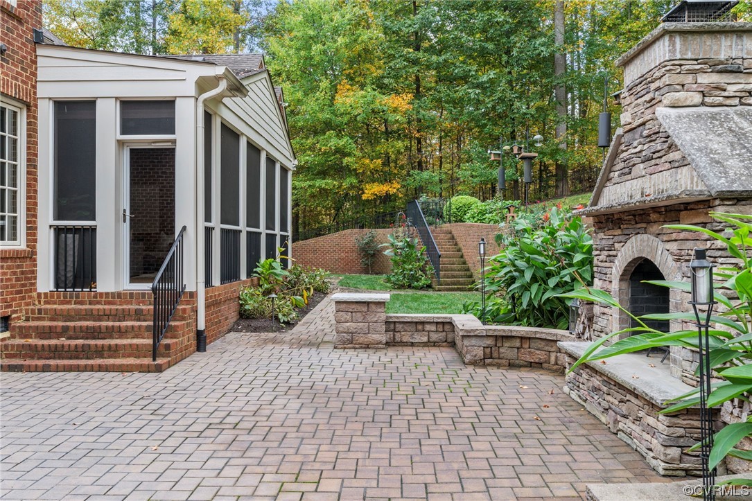 13213 Edmonton Drive Midlothian, VA 23113 - Photo 30 of 49 a front view of a house with garden