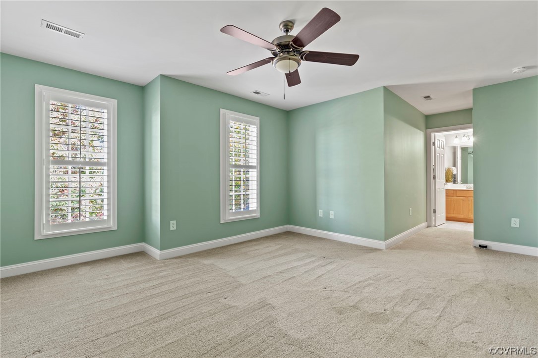 13213 Edmonton Drive Midlothian, VA 23113 - Photo 42 of 49 a view of an empty room with a window