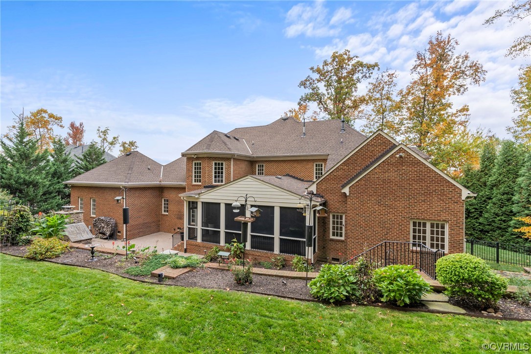 13213 Edmonton Drive Midlothian, VA 23113 - Photo 46 of 49 a front view of a house with a yard and potted plants