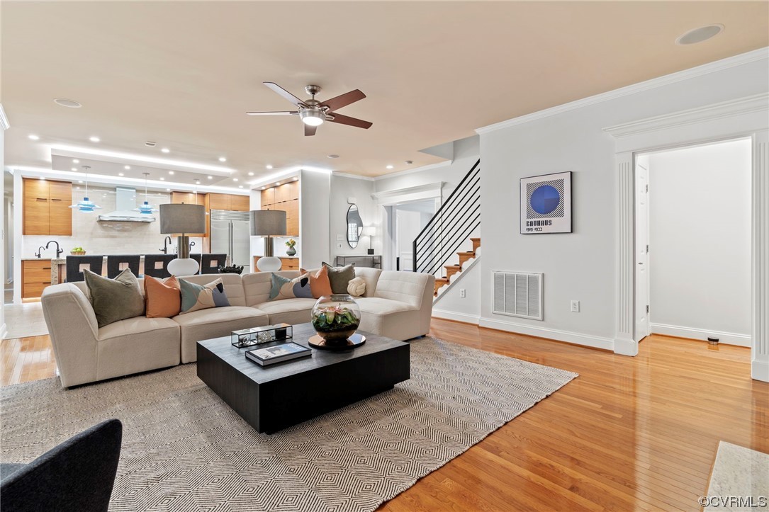 13213 Edmonton Drive Midlothian, VA 23113 - Photo 8 of 49 a living room with furniture kitchen view and a wooden floor