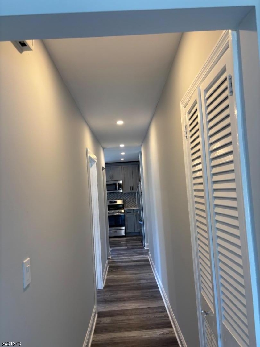 358 Woodland Road, Unit 2 Madison, NJ 07940 - Photo 26 of 50 a view of entryway and hall with wooden floor