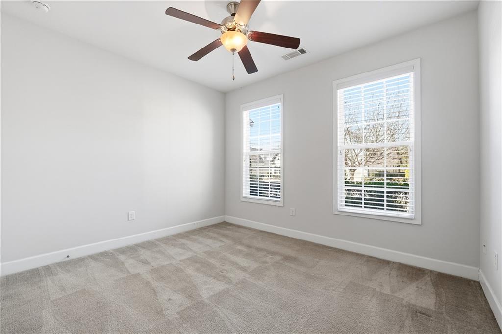 3751 Golden Leaf Point Southwest Gainesville, GA 30504 - Photo 19 of 45 a view of an empty room with a window