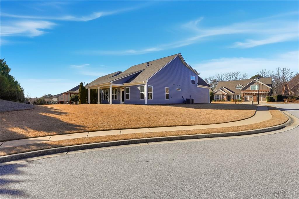 3751 Golden Leaf Point Southwest Gainesville, GA 30504 - Photo 28 of 45 a view of swimming pool with a yard