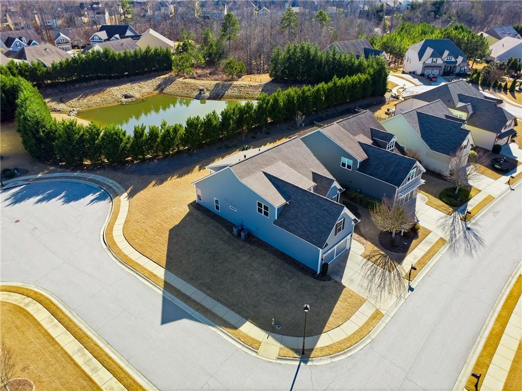 3751 Golden Leaf Point Southwest Gainesville, GA 30504 - Photo 30 of 45 an aerial view of a house with a swimming pool yard and outdoor seating