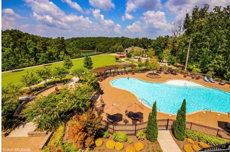 3751 Golden Leaf Point Southwest Gainesville, GA 30504 - Photo 41 of 45 view of a swimming pool with a patio and a yard