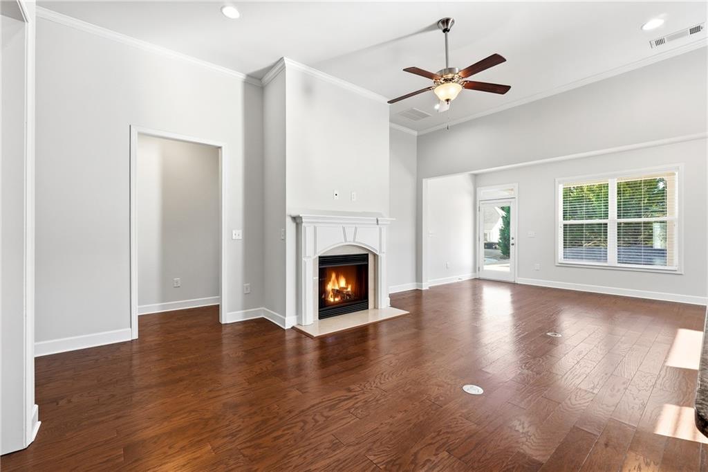 3751 Golden Leaf Point Southwest Gainesville, GA 30504 - Photo 9 of 45 a view of a livingroom with a fireplace and window