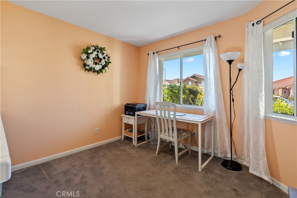 918 Inverness Drive Paso Robles, CA 93446 - Photo 11 of 38 a view of a workspace with furniture and a window