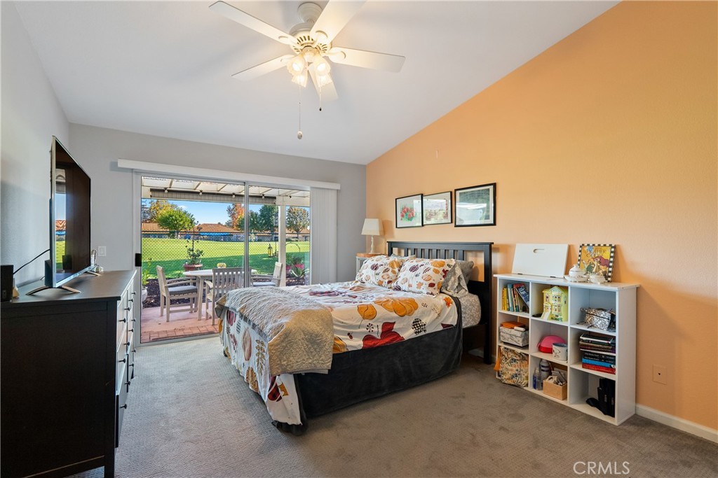 918 Inverness Drive Paso Robles, CA 93446 - Photo 13 of 38 a bed sitting in a bedroom next to a window