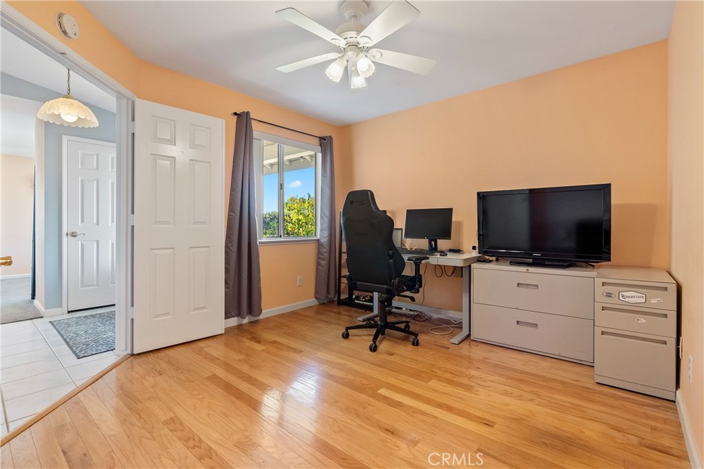 918 Inverness Drive Paso Robles, CA 93446 - Photo 19 of 38 a view of a livingroom with workspace and a window