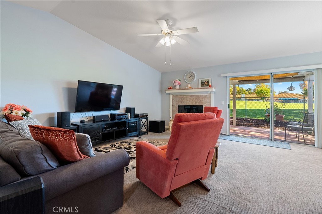 918 Inverness Drive Paso Robles, CA 93446 - Photo 4 of 38 a living room with furniture and a flat screen tv