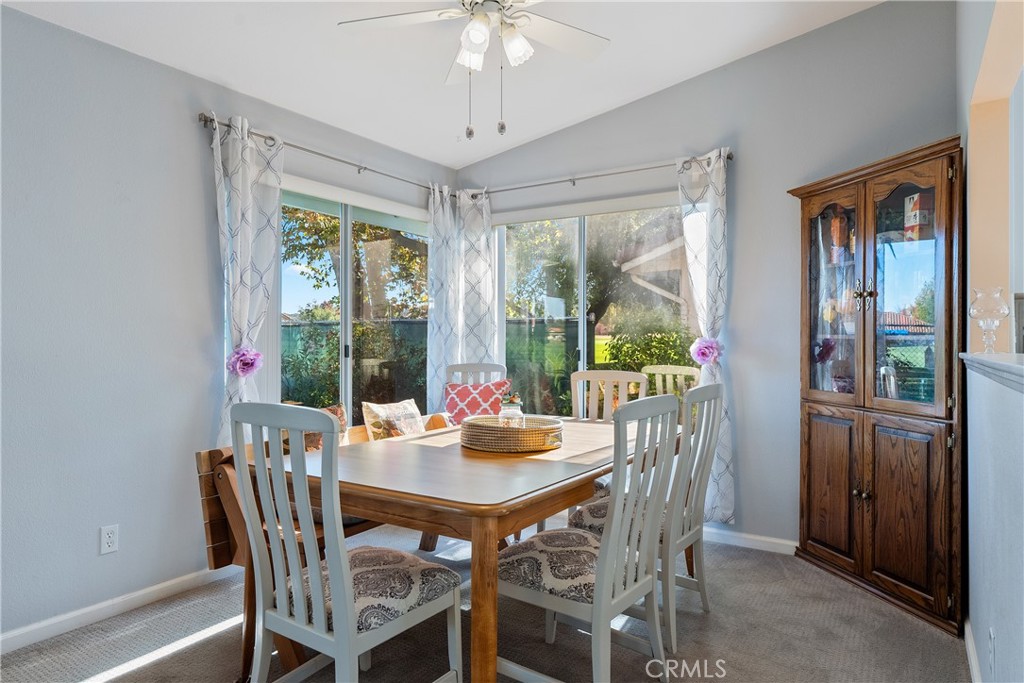 918 Inverness Drive Paso Robles, CA 93446 - Photo 7 of 38 a view of a dining room with furniture window and outside view