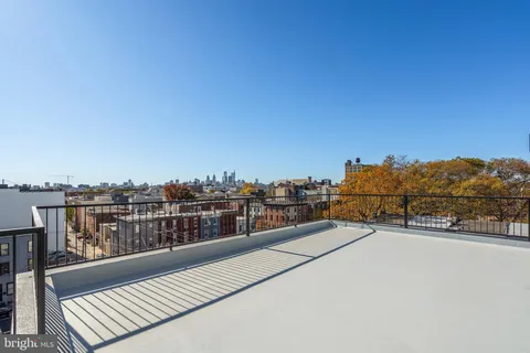 a view of city with tall buildings