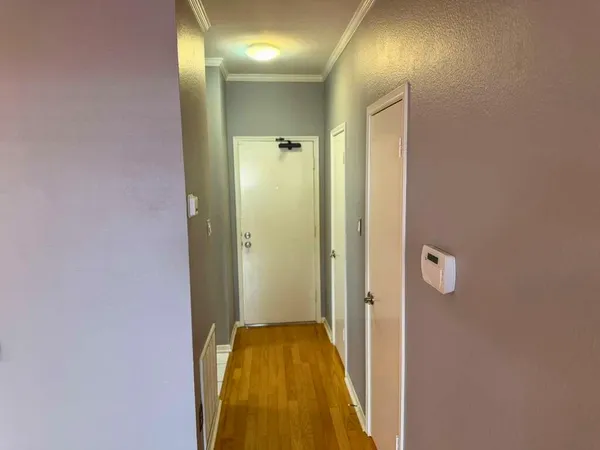 a bathroom with a tub and shower
