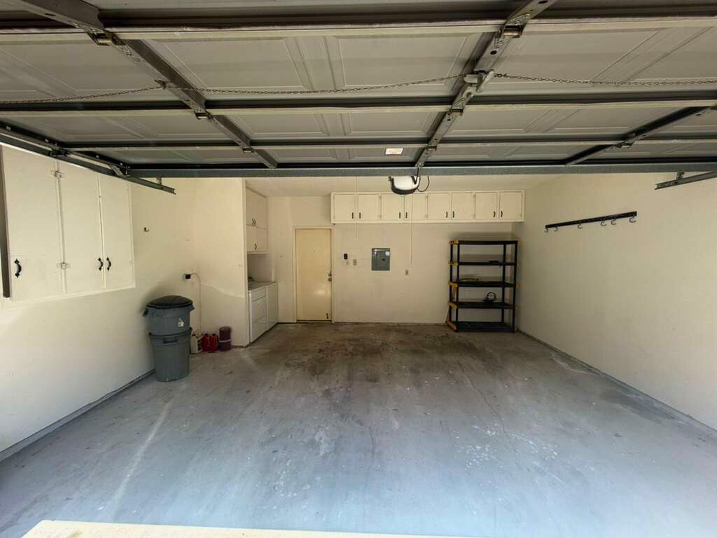 3780 Tanglewilde Street, Unit 306 Houston, TX 77063 - Photo 22 of 22 a view of a room with racks