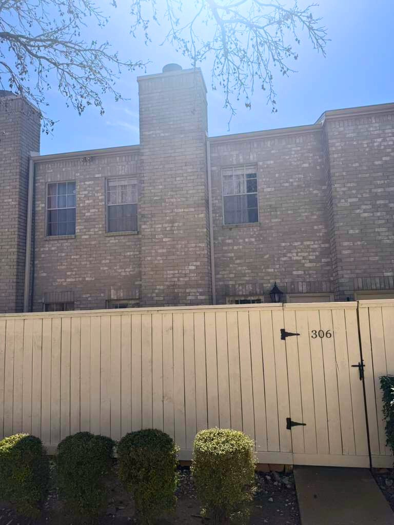3780 Tanglewilde Street, Unit 306 Houston, TX 77063 - Photo 3 of 22 a view of wooden cabinet