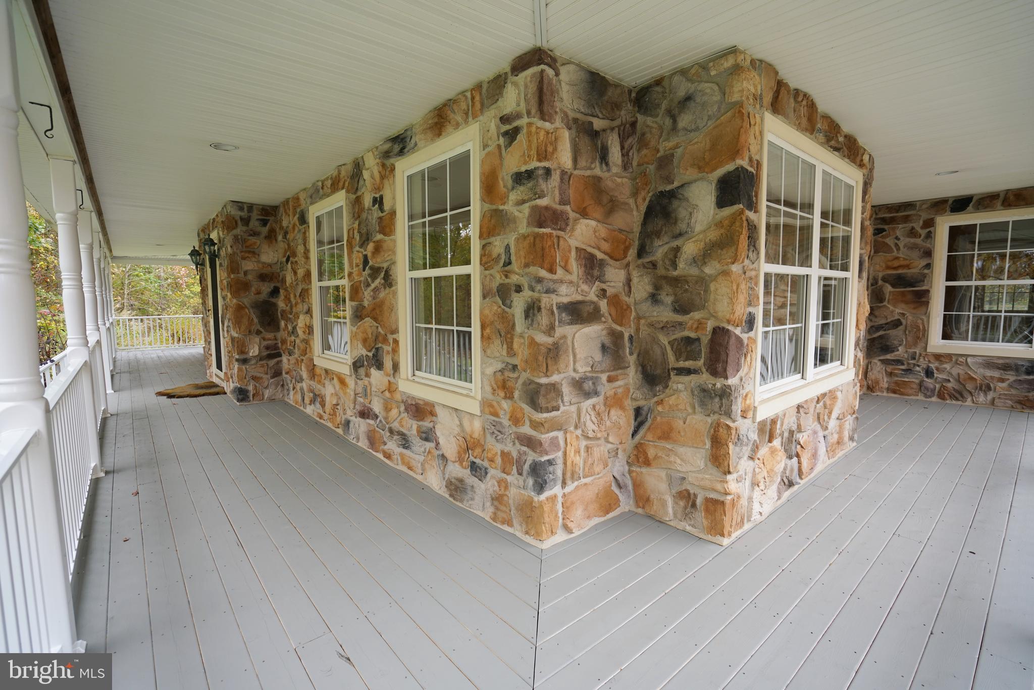 780 Forest Road Perkasie, PA 18944 - Photo 33 of 42 Wrap around porch (dining room windows)