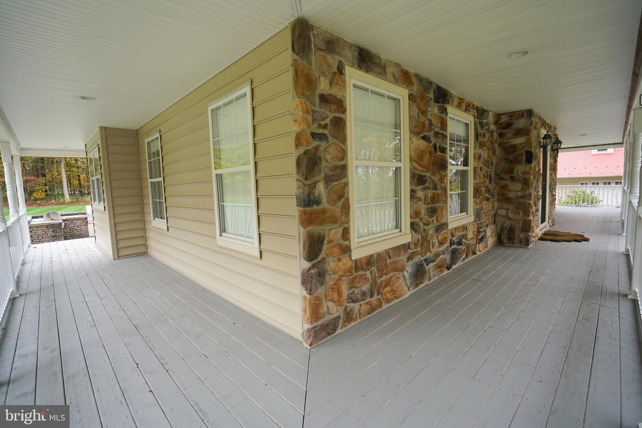 780 Forest Road Perkasie, PA 18944 - Photo 34 of 42 Wrap around porch has stairs to backyard