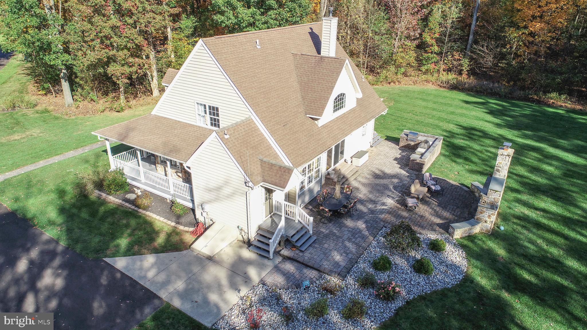 780 Forest Road Perkasie, PA 18944 - Photo 7 of 42 Shade trees keep the patio cool.