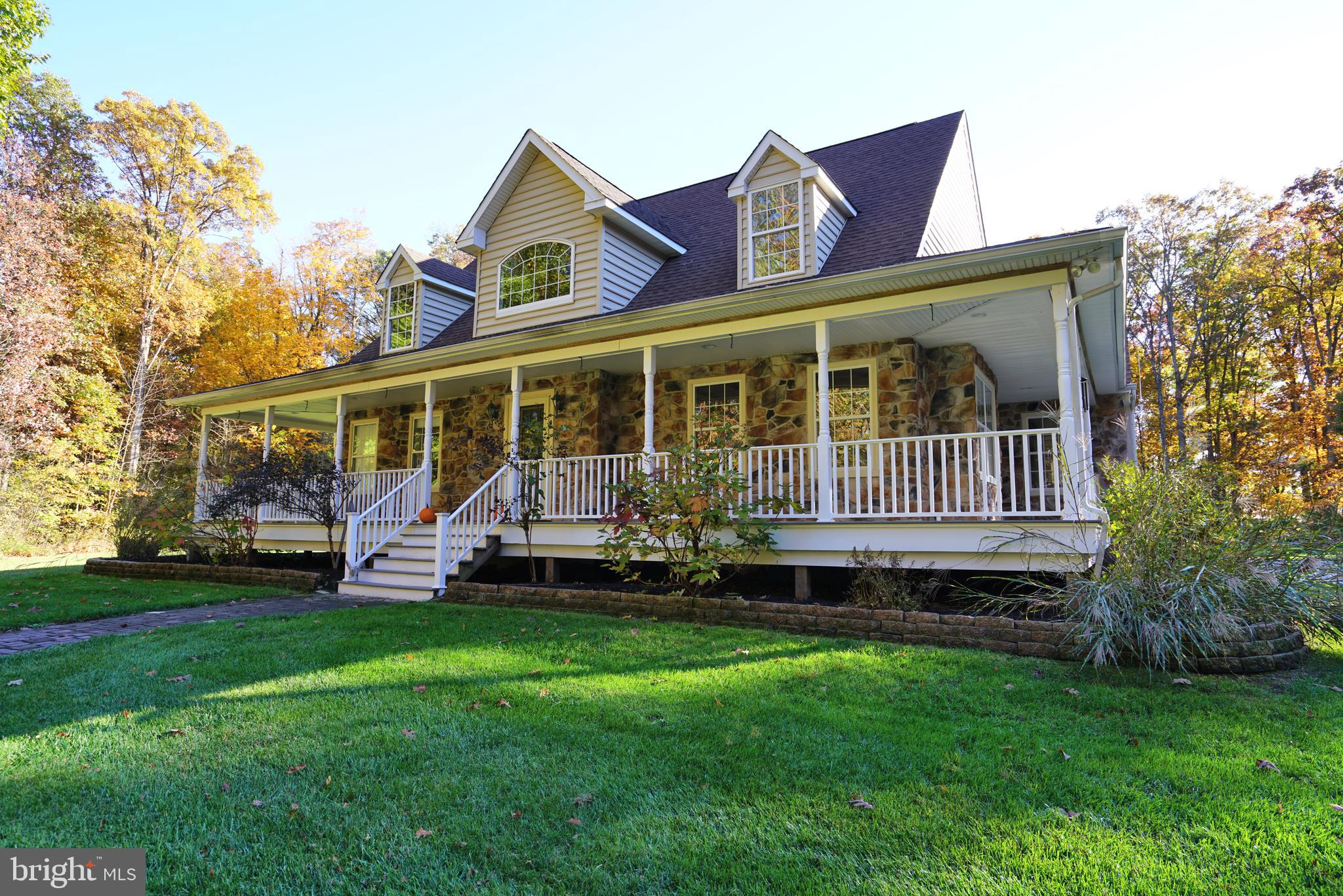 780 Forest Road Perkasie, PA 18944 - Photo 10 of 42 Stone front home with wrap around porch.