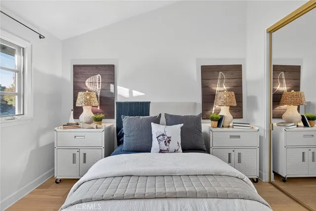 a bedroom with a bed and a dresser