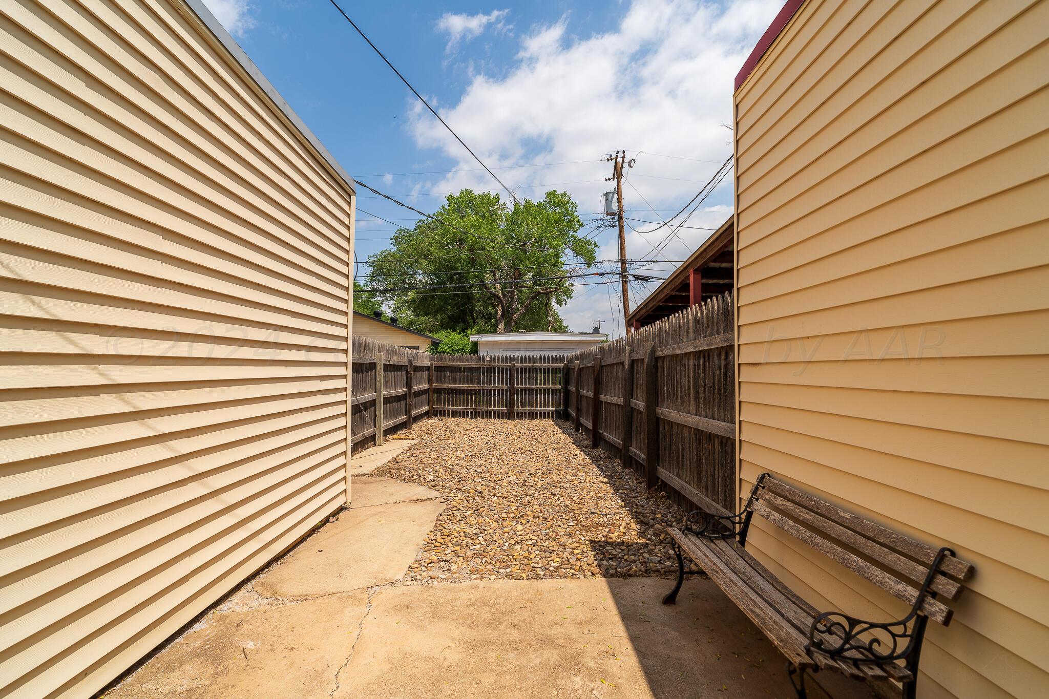 4202 Charles Street Amarillo, TX 79106 - Photo 23 of 25 a view of entryway with wooden floor