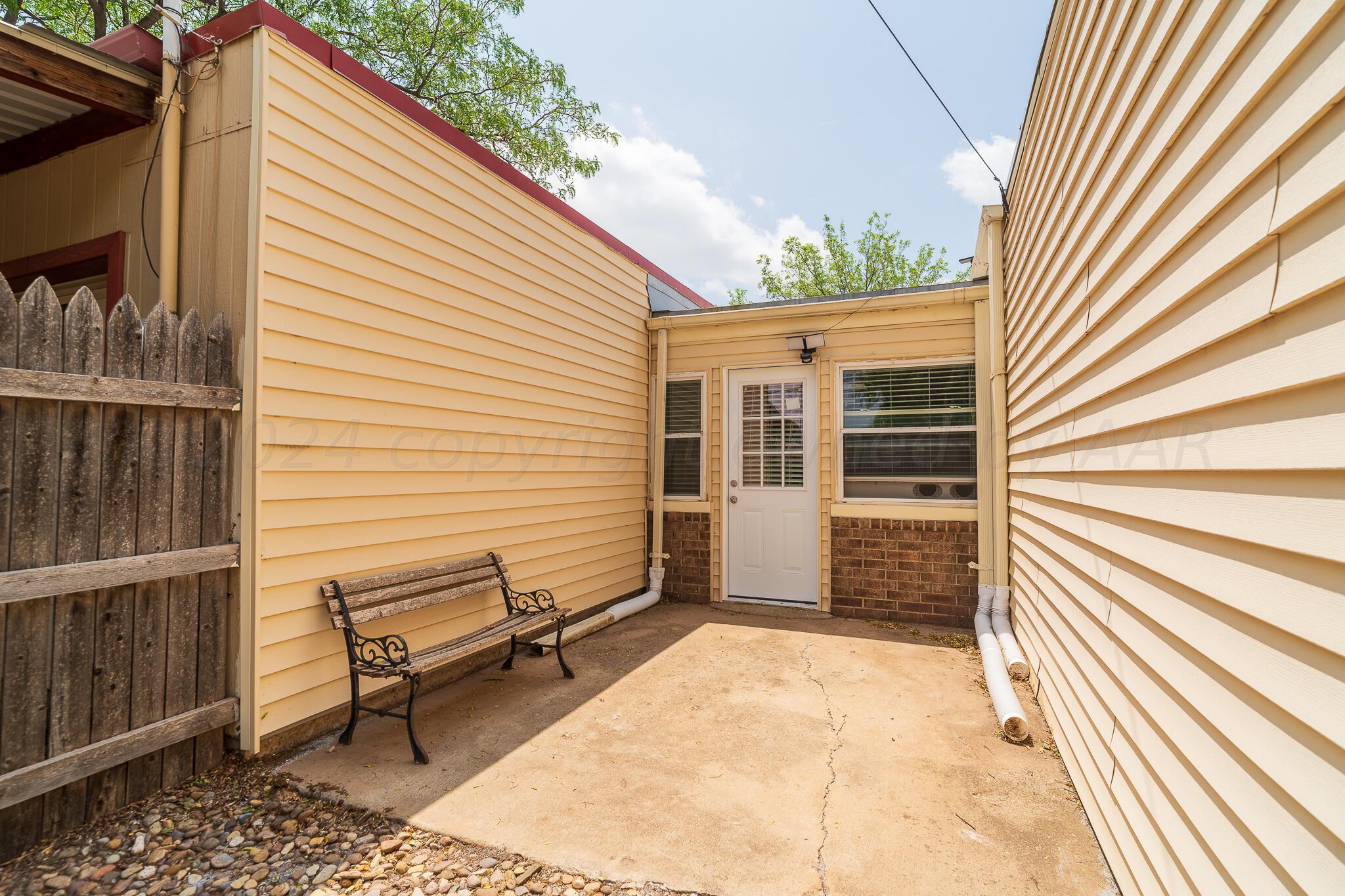 4202 Charles Street Amarillo, TX 79106 - Photo 25 of 25 a view of a house with backyard and sitting area