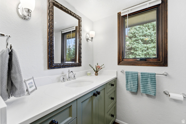 2635 Little Kate Road, Unit 21 Park City, UT 84060 - Photo 19 of 39 Bathroom featuring a textured wall and vanity