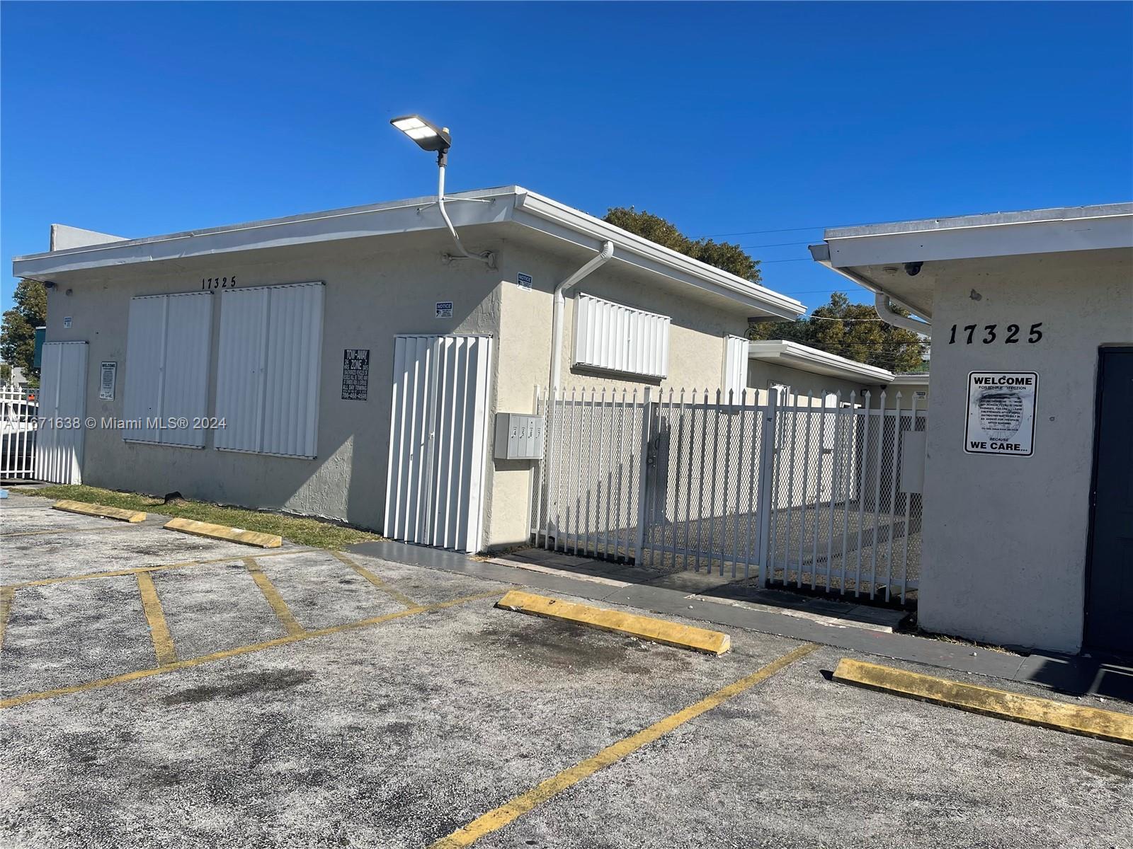 17325 Homestead Avenue, Unit 2 Miami, FL 33157 - Photo 1 of 5 a backyard of a house