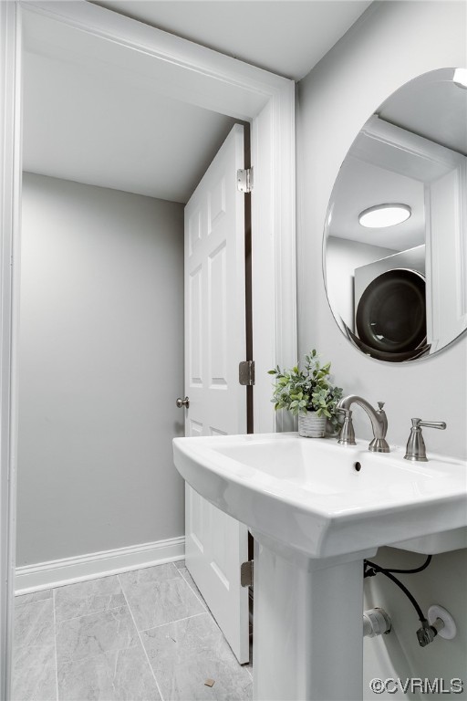 2225 Brookwood Road Richmond, VA 23235 - Photo 13 of 34 a bathroom with a sink and a mirror